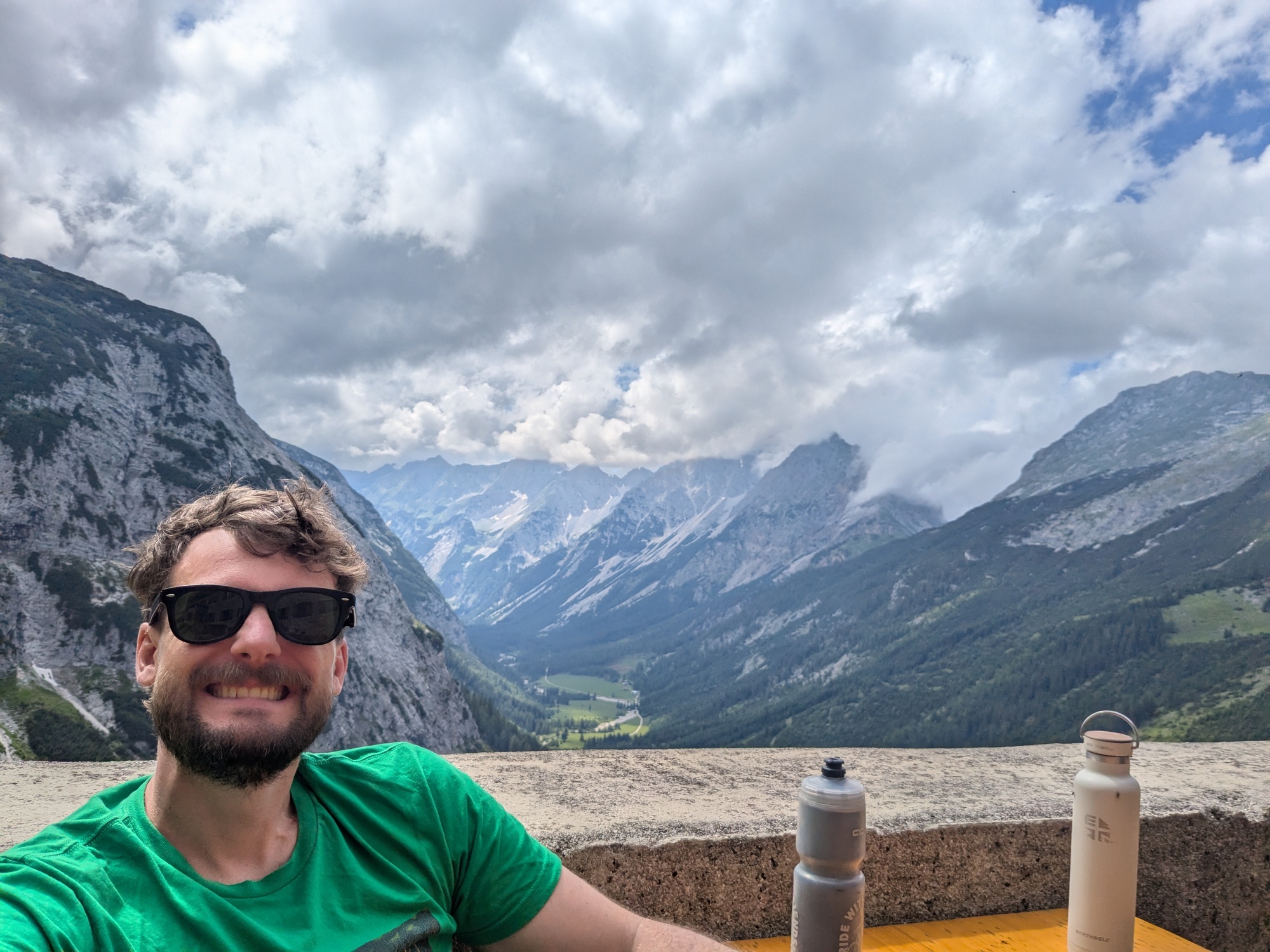 Tyler at a hut in the mountains