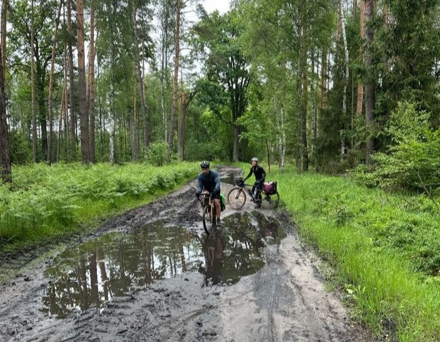 Biking through a mud pit after rainy day