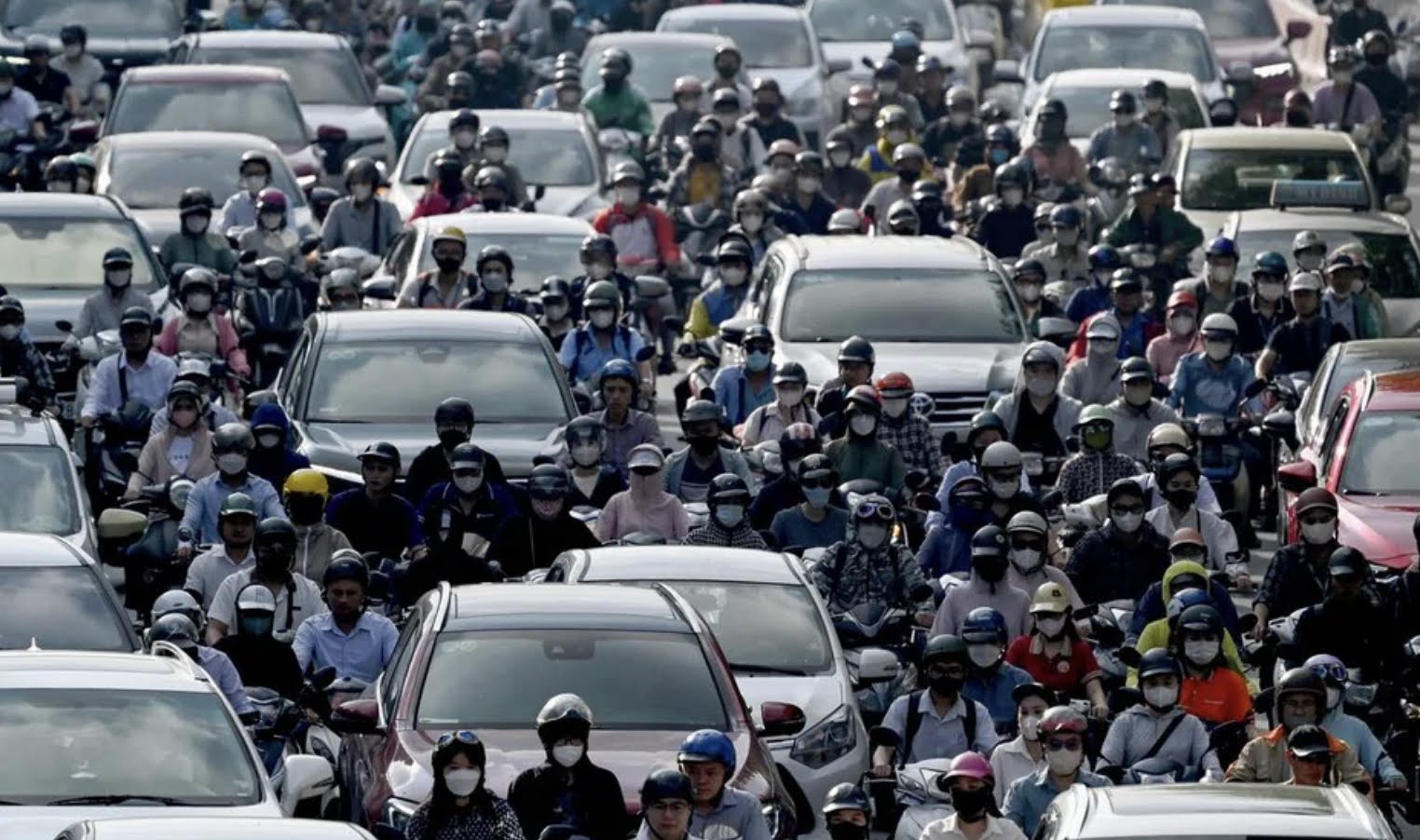 Cars and scooters as far as the eye can see! PHOTO: AFP