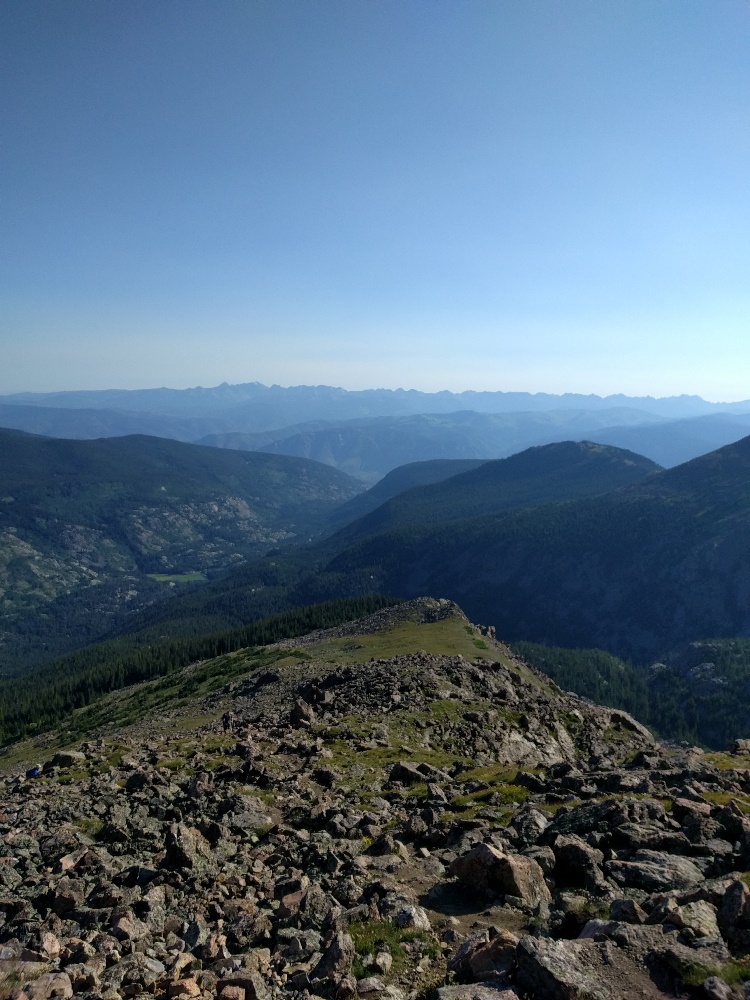 Above tree line all the neighboring peaks start looking small