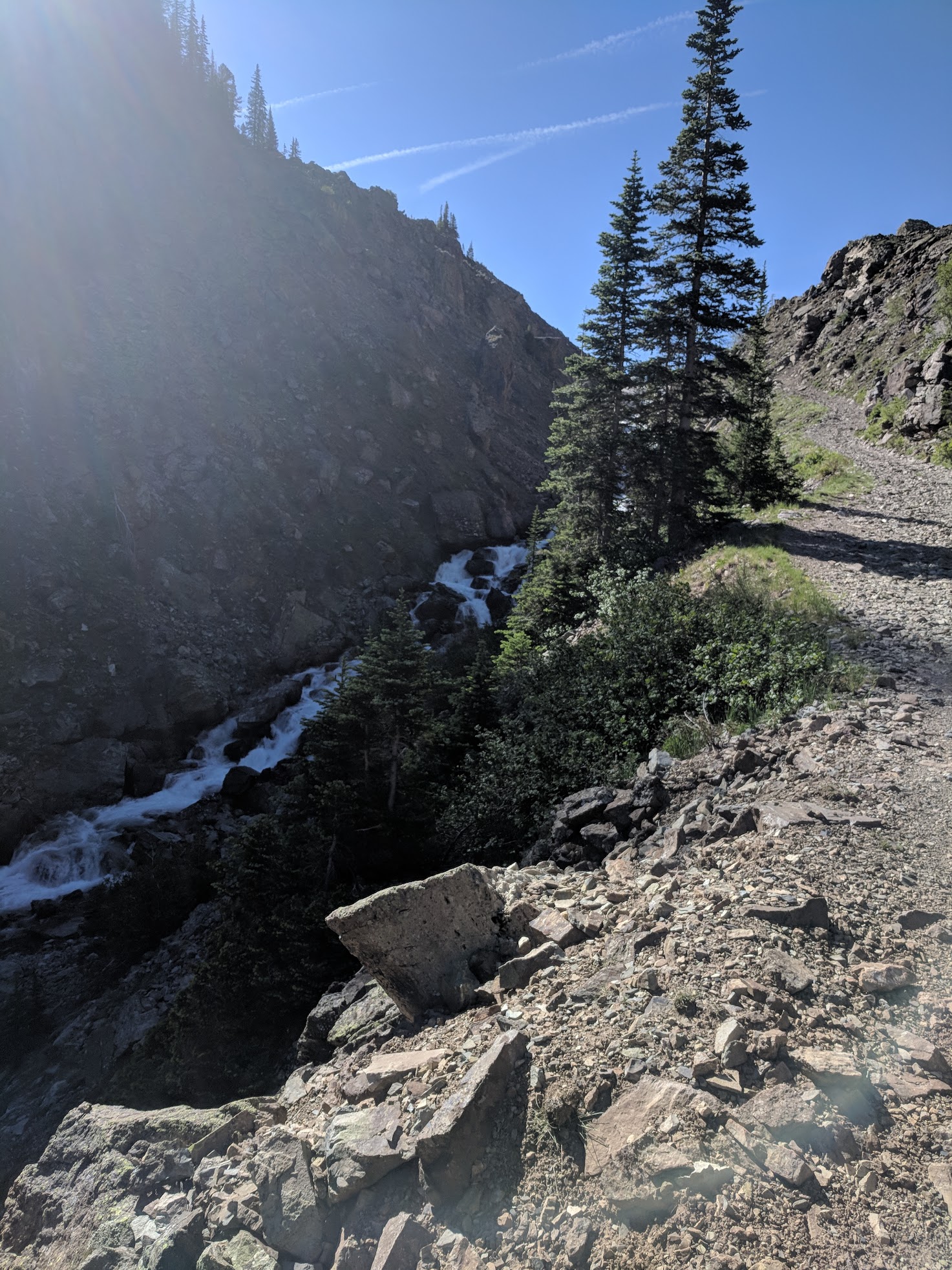 The water rushed down the canyon along side us.